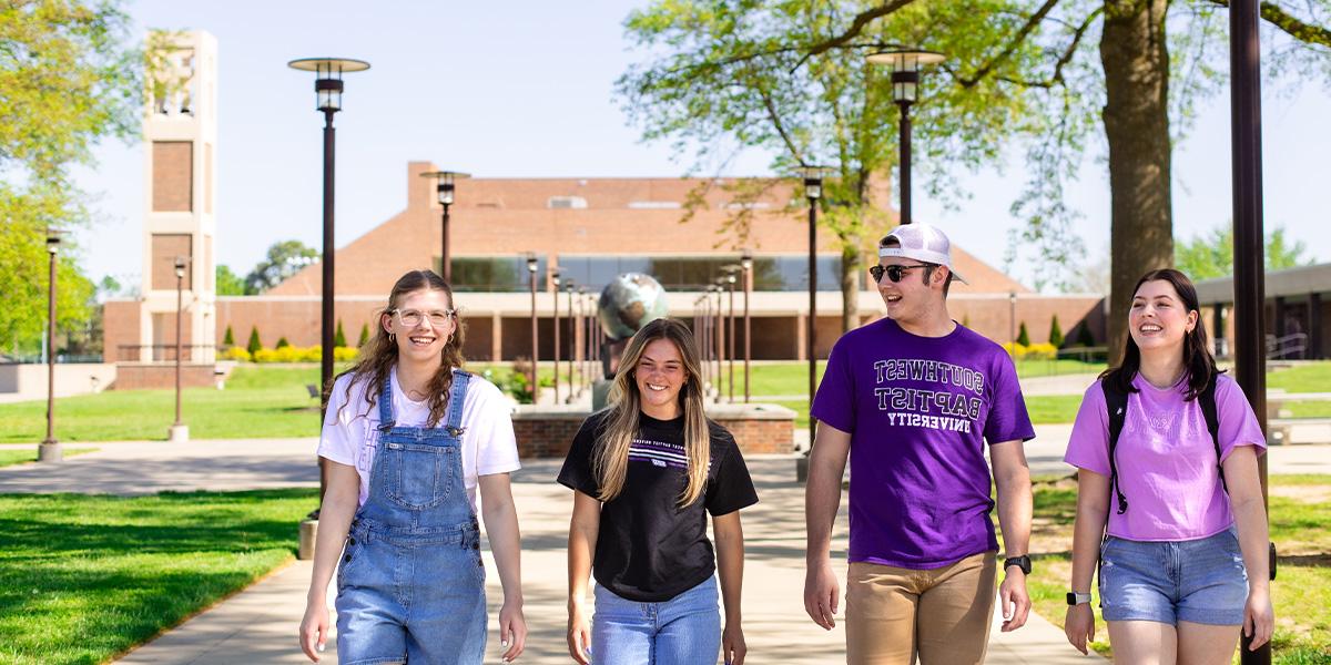 students walking on SBU campus